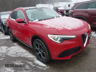 2019 Alfa Romeo Stelvio Ti Sport z VIN ZASPAKBN6K7C51123, wystawiony jako IAAI lot #41534168 z przebiegiem 64 439 mil mil oraz . Historia ofert i sprzedaży dostępna na DreamBid. Obrazek 1.