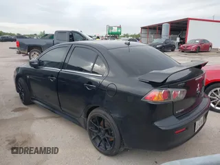 2016 Mitsubishi Lancer GT with VIN JA32U8FW8GU011501, listed as a IAAI auction lot 41779016 with 153,082 mi miles. Bid and sale history available at carsss.com. Image 3.