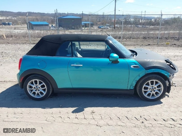 2016 MINI Cooper Convertible with VIN WMWWG5C53G3C18842, listed as a IAAI auction lot 41864596 with 91,253 mi miles. Bid and sale history available at carsss.com. Image 13.