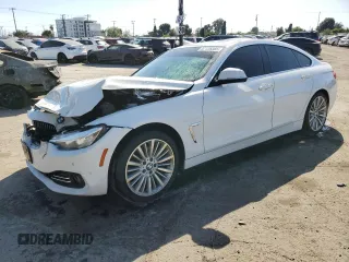 2015 BMW 4 Series 428i with VIN WBA4A9C58FGL85220, listed as a Copart auction lot 57128265 with 115,257 mi miles and Salvage title. Bid and sale history available at DreamBid. Image 1.