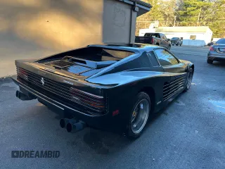 1988 Pontiac Fiero z VIN 1G2PE119XJP213392, wystawiony jako Copart lot #55215415 z przebiegiem 71 246 mil mil oraz Tytuł czysty. Historia ofert i sprzedaży dostępna na DreamBid. Obrazek 4.