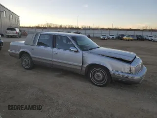 1993 Chrysler New Yorker z VIN 1C3XV66R3PD198654, wystawiony jako Copart lot #78900554 z przebiegiem 187 872 mil mil oraz Szkody całkowita. Historia ofert i sprzedaży dostępna na DreamBid. Obrazek 4.