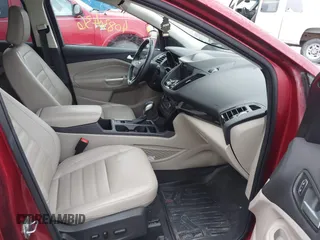 2019 Ford Escape Titanium z VIN 1FMCU9J99KUA18880, wystawiony jako IAAI lot #40830436 z przebiegiem 117 499 mil mil oraz . Historia ofert i sprzedaży dostępna na DreamBid. Obrazek 5.