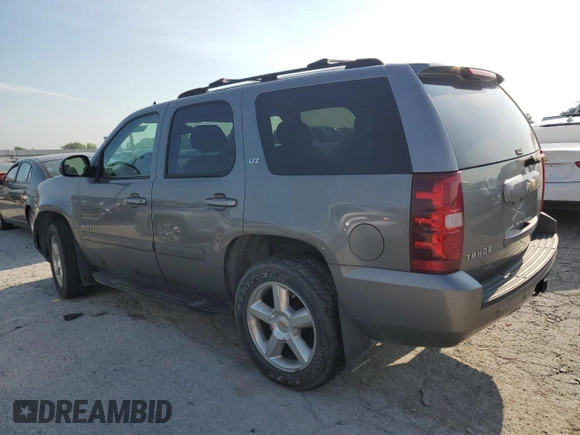 2007 Chevrolet Tahoe LT with VIN 1GNFK130X7J163515, listed as a Copart auction lot 61638245 with 246,785 mi miles and Salvage title. Bid and sale history available at DreamBid. Image 2.