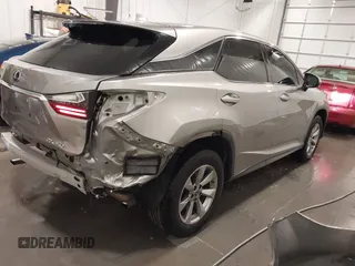 2018 Lexus RX 350 with VIN 2T2BZMCA7JC163886, listed as a IAAI auction lot 42248863 with 57,319 mi miles and . Bid and sale history available at DreamBid. Image 4.