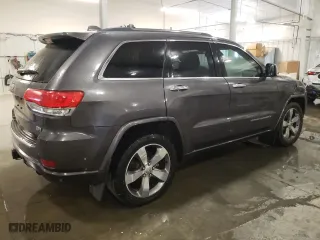 2014 Jeep Grand Cherokee Overland with VIN 1C4RJFCG6EC279248, listed as a Copart auction lot 49300895 with 165,248 mi miles and Salvage Title. Bid and sale history available at carsss.com. Image 3.