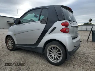 2011 Smart fortwo Pure with VIN WMEEJ3BA5BK438144, listed as a Copart auction lot 51934465 with 135,584 mi miles and Salvage title. Bid and sale history available at DreamBid. Image 2.