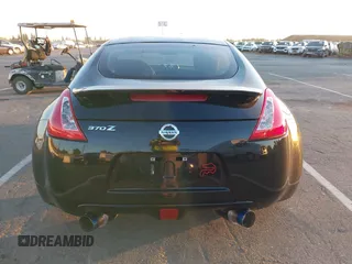 2015 Nissan 370Z Sport z VIN JN1AZ4EH5FM442339, wystawiony jako IAAI lot #42304030 z przebiegiem 73 272 mil mil oraz . Historia ofert i sprzedaży dostępna na DreamBid. Obrazek 16.