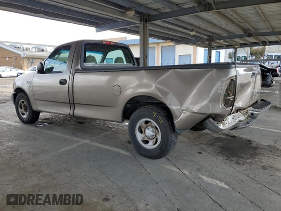 2002 Ford F-150 XL with VIN 1FTRF17W62NB40159, listed as a Copart auction lot 49010765 with 166,719 mi miles and Salvage Title. Bid and sale history available at carsss.com. Image 2.