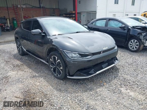 2022 Kia EV6 Wind z VIN KNDC3DLC5N5034625, wystawiony jako IAAI lot #42263100 z przebiegiem 35 412 mil mil oraz . Historia ofert i sprzedaży dostępna na DreamBid. Obrazek 1.