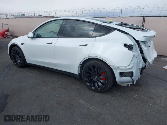 2023 Tesla Model Y Performance with VIN 7SAYGDEFXPF589477, listed as a IAAI auction lot 41936981 with 28,993 mi miles and . Bid and sale history available at DreamBid. Image 3.