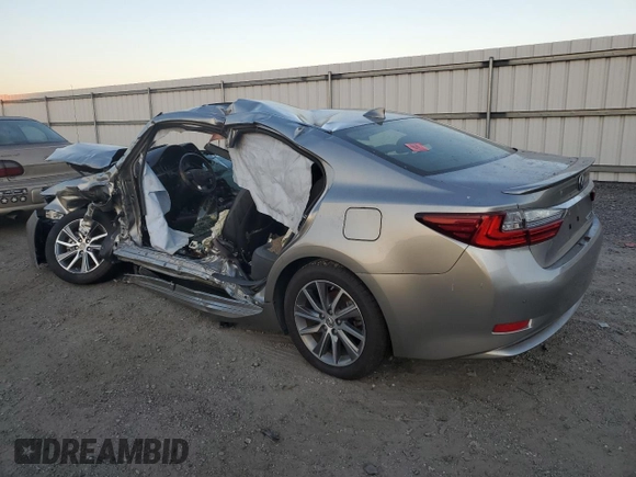 2018 Lexus ES with VIN JTHBW1GG8J2177593, listed as a Copart auction lot 77299034 with 0 mi miles and Salvage Title. Bid and sale history available at carsss.com. Image 2.