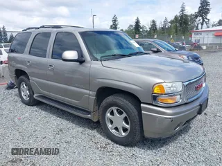 2002 GMC Yukon Denali z VIN 1GKEK63U52J216929, wystawiony jako IAAI lot #42266942 z przebiegiem 202 269 mil mil oraz . Historia ofert i sprzedaży dostępna na DreamBid. Obrazek 1.