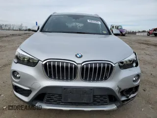 2018 BMW X1 sDrive28i with VIN WBXHU7C3XJ5H38873, listed as a Copart auction lot 49822205 with 46,847 mi miles and Salvage Title. Bid and sale history available at carsss.com. Image 5.