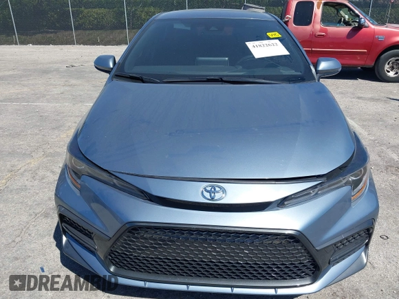 2021 Toyota Corolla SE with VIN JTDS4MCE1MJ063524, listed as a IAAI auction lot 41822622 with 50,882 mi miles. Bid and sale history available at carsss.com. Image 12.