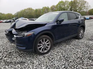 2020 Mazda CX-5 Grand Touring with VIN JM3KFBDM2L0729290, listed as a Copart auction lot 56102175 with 51,657 mi miles and Salvage title. Bid and sale history available at DreamBid. Image 1.