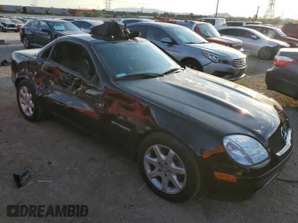 1999 Mercedes-Benz SLK-Class with VIN WDBKK47F1XF124854, listed as a Copart auction lot 73160604 with 55,730 mi miles and Salvage Title. Bid and sale history available at carsss.com. Image 4.