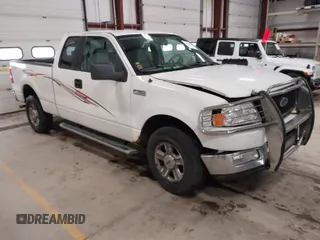 2005 Ford F-150 XLT with VIN 1FTPX14565FB60720, listed as a IAAI auction lot 41728673 with 148,187 mi miles. Bid and sale history available at carsss.com. Image 1.