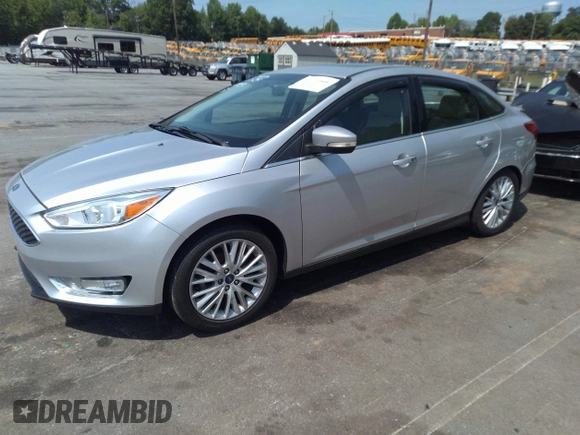 2018 Ford Focus Titanium with VIN 1FADP3J26JL280723, listed as a IAAI auction lot 42319900 with 149,583 mi miles and . Bid and sale history available at DreamBid. Image 2.
