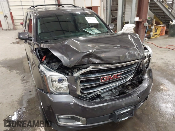 2016 GMC Yukon SLT z VIN 1GKS2BKC2GR320923, wystawiony jako IAAI lot #42196868 z przebiegiem 134 754 mil mil oraz . Historia ofert i sprzedaży dostępna na DreamBid. Obrazek 6.