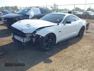 2023 Ford Mustang GT with VIN 1FA6P8CF6P5304456, listed as a IAAI auction lot 42407246 with 59,538 mi miles and . Bid and sale history available at DreamBid. Image 18.