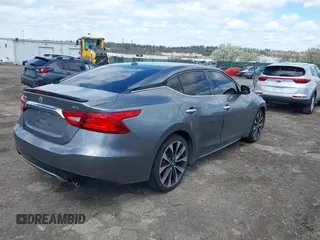 2016 Nissan Maxima SL with VIN 1N4AA6AP8GC385175, listed as a IAAI auction lot 41987763 with 117,485 mi miles and . Bid and sale history available at DreamBid. Image 4.