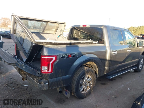 2015 Ford F-150 XLT with VIN 1FTEW1EP1FKE16670, listed as a IAAI auction lot 41120641 with 102,770 mi miles. Bid and sale history available at carsss.com. Image 4.