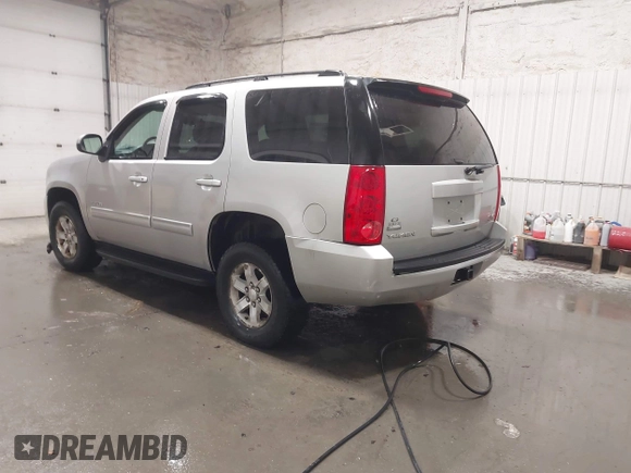 2011 GMC Yukon SLE with VIN 1GKS2AE01BR233860, listed as a IAAI auction lot 41838392 with 226,611 mi miles. Bid and sale history available at carsss.com. Image 3.
