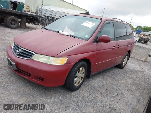2002 Honda Odyssey EX-L z VIN 2HKRL18092H572036, wystawiony jako IAAI lot #42122713 z przebiegiem Nie podano mil oraz . Historia ofert i sprzedaży dostępna na DreamBid. Obrazek 2.