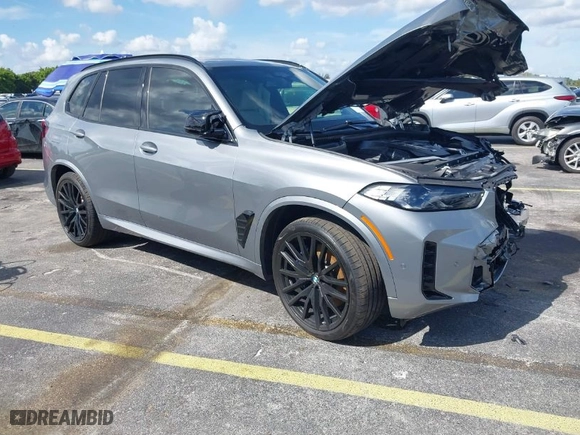 2025 BMW X5 M60i with VIN 5UX33EU03S9X62019, listed as a IAAI auction lot 41623189 with 5,749 mi miles. Bid and sale history available at carsss.com. Image 1.