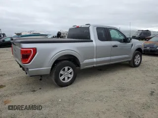 2021 Ford F-150 XL with VIN 1FTEX1CB2MKE77401, listed as a Copart auction lot 52754445 with 87,029 mi miles and Salvage title. Bid and sale history available at DreamBid. Image 3.