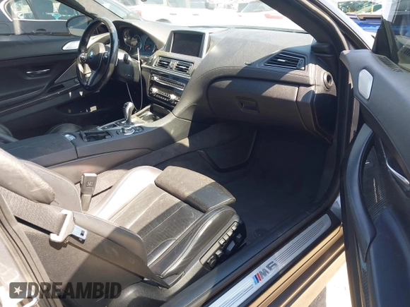 2013 BMW M6 with VIN WBSLX9C51DC968593, listed as a IAAI auction lot 42465979 with 88,010 mi miles and . Bid and sale history available at DreamBid. Image 5.