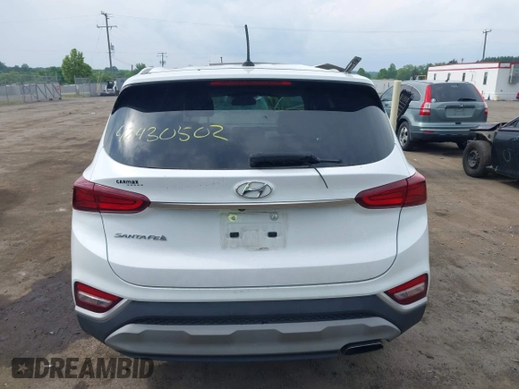 2019 Hyundai Santa Fe SE with VIN 5NMS23AD7KH111542, listed as a IAAI auction lot 42430502 with 78,755 mi miles and . Bid and sale history available at DreamBid. Image 16.