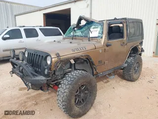 2015 Jeep Wrangler Sport with VIN 1C4AJWAG5FL589814, listed as a IAAI auction lot 39073787 with 113,776 mi miles. Bid and sale history available at carsss.com. Image 18.