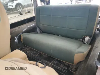 1998 Jeep Wrangler Sahara with VIN 1J4FY49S0WP749826, listed as a Copart auction lot 55174205 with 203,574 mi miles and Salvage title. Bid and sale history available at DreamBid. Image 10.