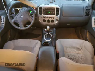 2006 Ford Escape Hybrid with VIN 1FMCU95H36KC95950, listed as a Copart auction lot 83957834 with 139,141 mi miles and Salvage title. Bid and sale history available at DreamBid. Image 8.