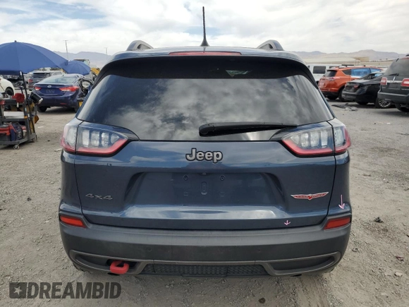 2019 Jeep Cherokee Trailhawk с VIN 1C4PJMBX7KD441911, выставлен на аукционе Copart как лот 53752285 с пробегом 82 110 миль миль и Списание • Salvage title. История ставок и продаж доступна на DreamBid. Изображение 6.