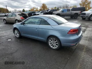 2013 Volkswagen Eos Komfort with VIN WVWBW8AH9DV007077, listed as a Copart auction lot 80254434 with 87,620 mi miles and Salvage Title. Bid and sale history available at DreamBid. Image 2.