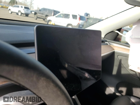 2024 Tesla Model Y Long Range with VIN 7SAYGAEEXRF056411, listed as a Copart auction lot 89218715 with Not Provided miles and Salvage Title. Bid and sale history available at DreamBid. Image 9.