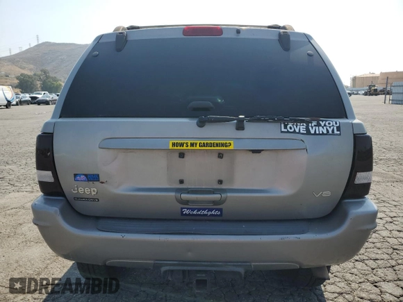 2001 Jeep Grand Cherokee Limited with VIN 1J4GW58N11C721108, listed as a Copart auction lot 60176915 with 257,907 mi miles and Salvage title. Bid and sale history available at DreamBid. Image 6.
