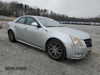 2013 Cadillac CTS Premium with VIN 1G6DS5E38D0154184, listed as a Copart auction lot 88666575 with 132,127 mi miles and Salvage title. Bid and sale history available at DreamBid. Image 4.