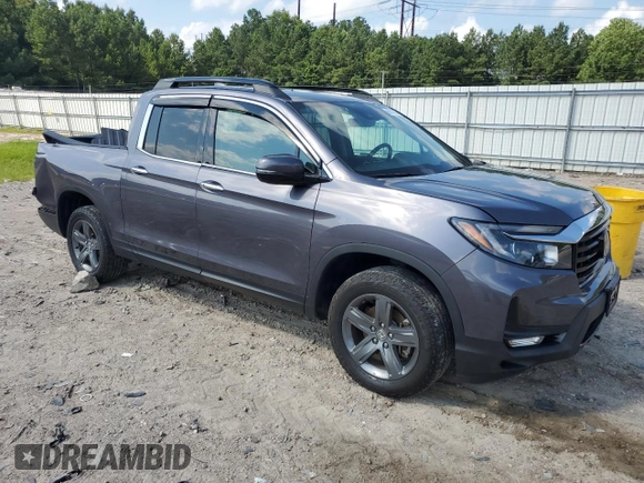 2022 Honda Ridgeline RTL-E with VIN 5FPYK3F72NB000908, listed as a Copart auction lot 65631535 with 35,796 mi miles and Salvage title. Bid and sale history available at DreamBid. Image 4.