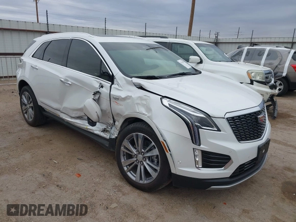 2024 Cadillac XT5 Premium Luxury AWD with VIN 1GYKNERSXRZ707816, listed as a IAAI auction lot 41749596 with 8,701 mi miles. Bid and sale history available at carsss.com. Image 1.