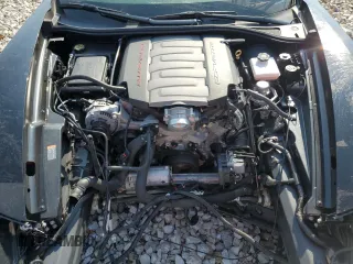 2015 Chevrolet Corvette 1LT z VIN 1G1YA3D79F5116374, wystawiony jako Copart lot #57310375 z przebiegiem 10 591 mil mil oraz Szkoda całkowita • Salvage title. Historia ofert i sprzedaży dostępna na DreamBid. Obrazek 11.