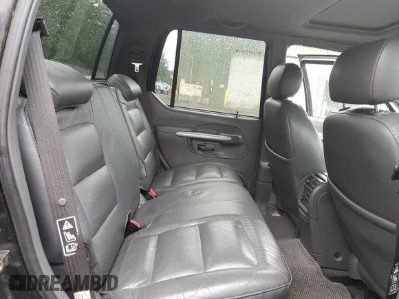 2002 Ford Explorer Sport Trac Value with VIN 1FMZU77E62UB21709, listed as a Copart auction lot 50081245 with 206,068 mi miles and Salvage title. Bid and sale history available at DreamBid. Image 11.