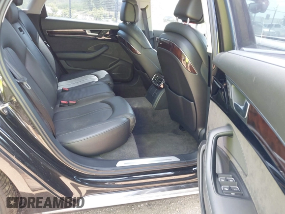 2011 Audi A8 with VIN WAURVAFD6BN005425, listed as a IAAI auction lot 42623409 with 264,365 mi miles and . Bid and sale history available at DreamBid. Image 8.