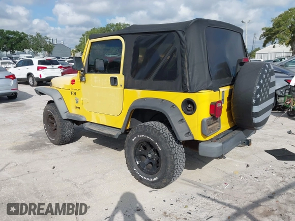 2002 Jeep Wrangler X z VIN 1J4FA39S82P719241, wystawiony jako IAAI lot #42150742 z przebiegiem 147 914 mil mil oraz . Historia ofert i sprzedaży dostępna na DreamBid. Obrazek 3.