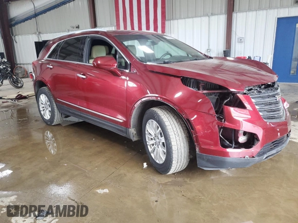 2017 Cadillac XT5 FWD with VIN 1GYKNARS6HZ193356, listed as a Copart auction lot 58356665 with 122,606 mi miles and Salvage title. Bid and sale history available at DreamBid. Image 4.