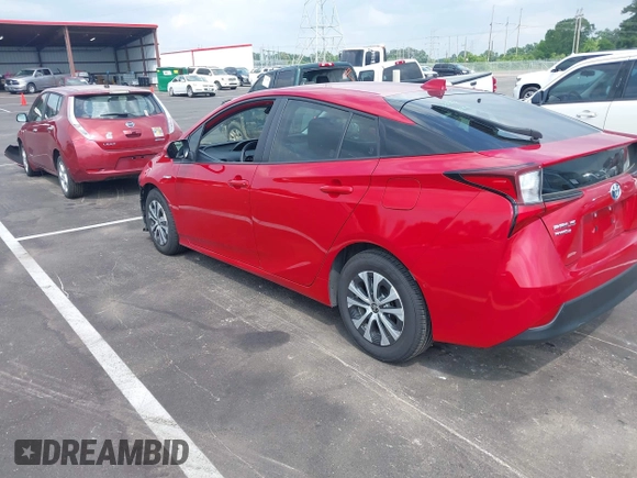 2021 Toyota Prius LE with VIN JTDL9MFU0M3029880, listed as a IAAI auction lot 42450003 with 91,558 mi miles and . Bid and sale history available at DreamBid. Image 3.