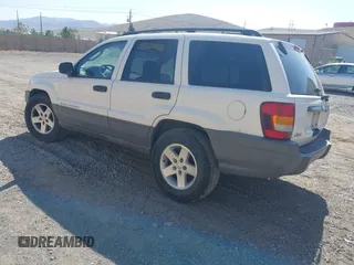 2004 Jeep Grand Cherokee Laredo with VIN 1J4GX48SX4C151160, listed as a IAAI auction lot 42765441 with 176,179 mi miles and . Bid and sale history available at DreamBid. Image 3.
